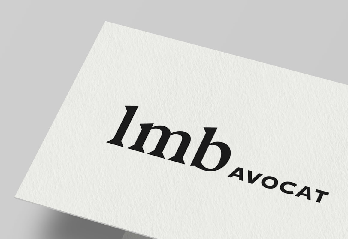 gros plan sur la carte de visite de lmb avocat au bareau de Paris, design jean-charles abrial